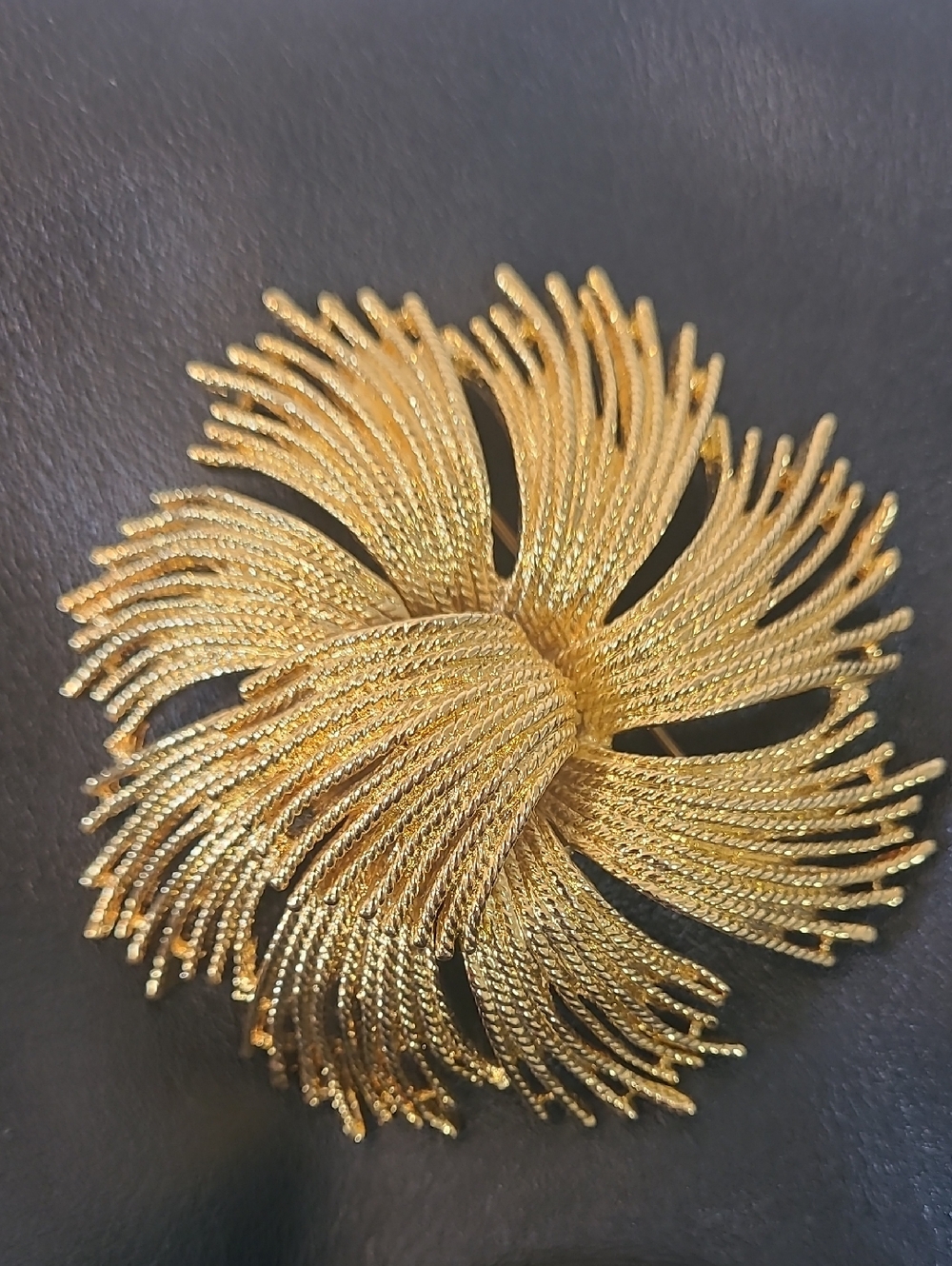 Monet Vintage Cordelia Gold Tone Starburst Brooch with Textured Metal Threads